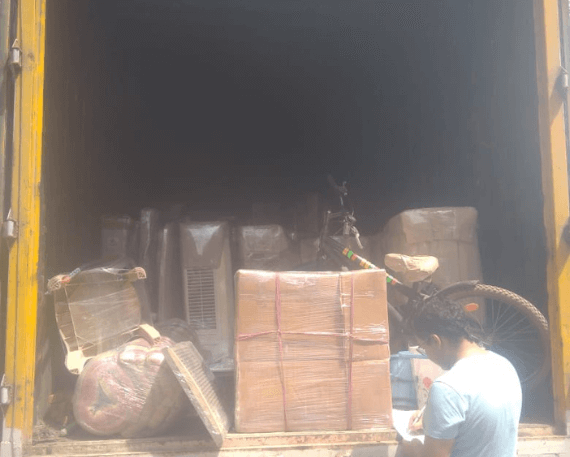 Gati Relocation team carefully packing and organizing household goods for safe and systematic relocation